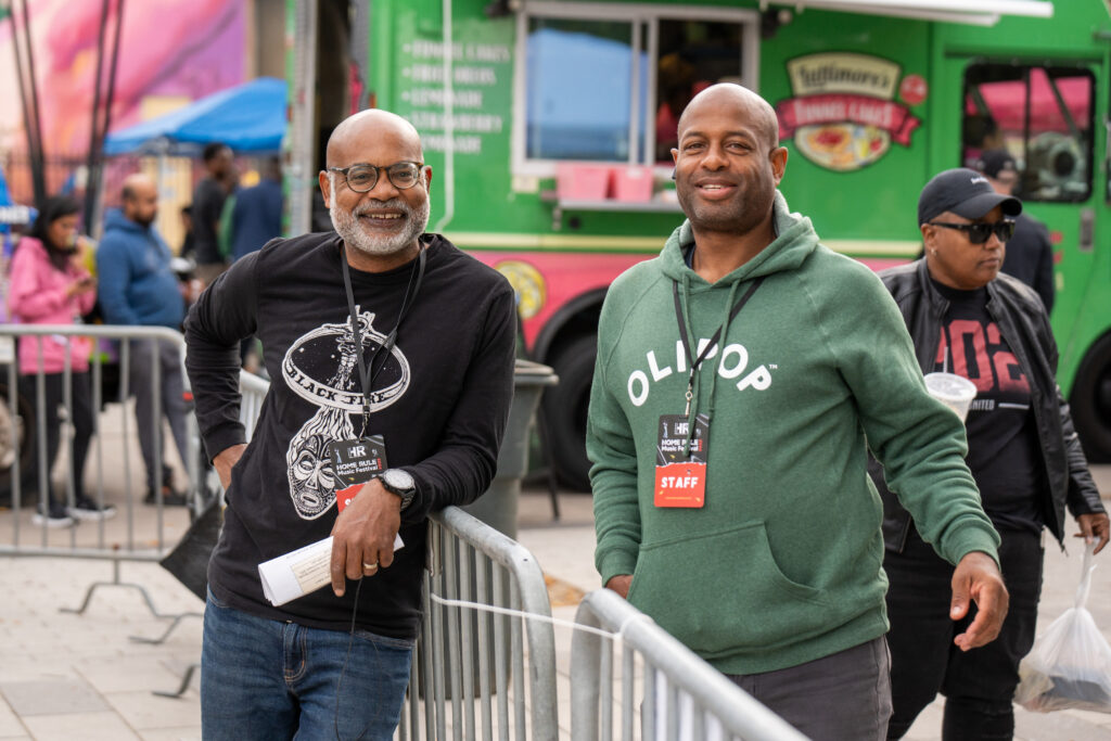 Charvis Campbell and staff member at the October 26 festival date for the 2024 Home Rule Music Festival